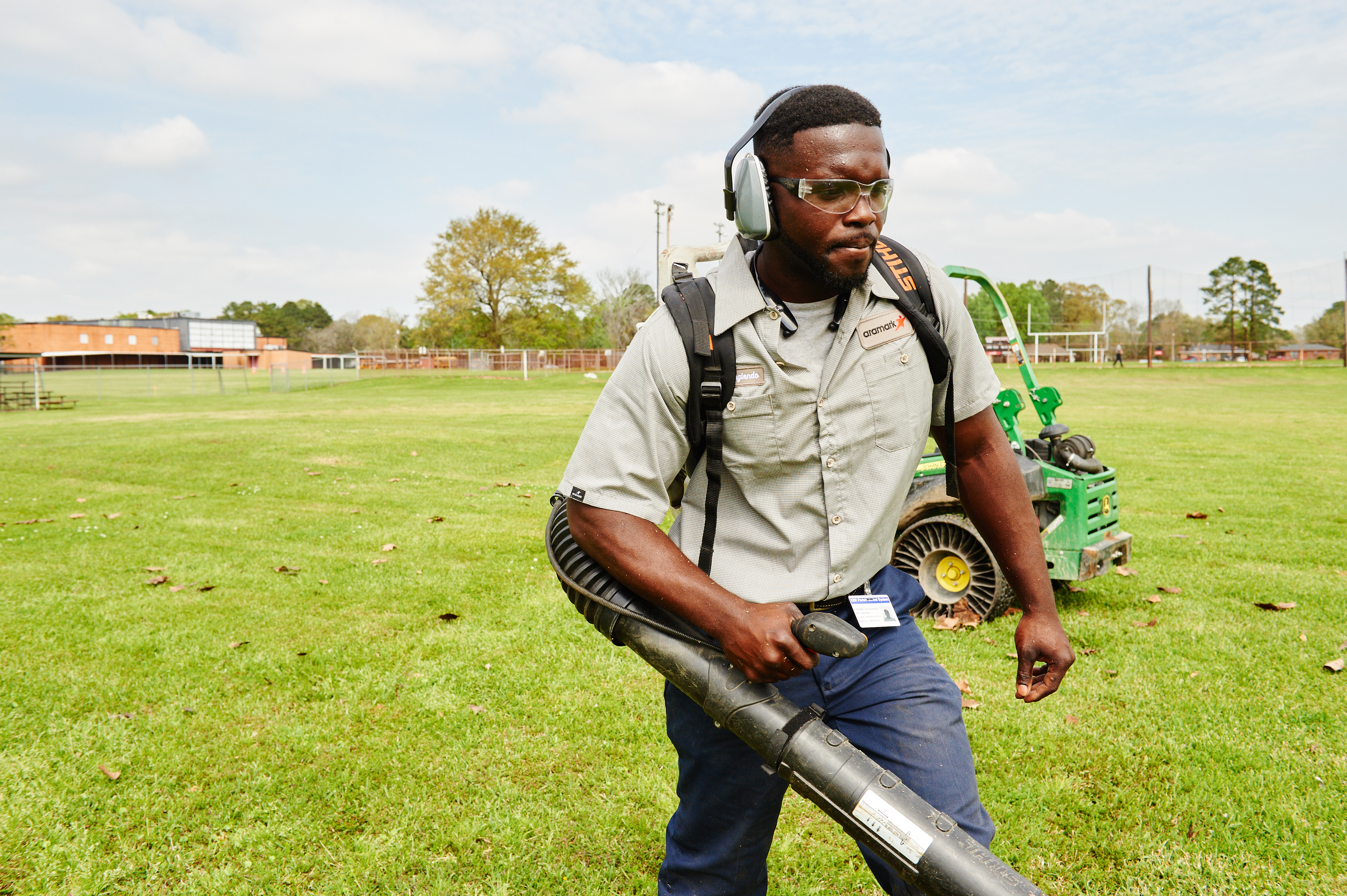 Man with a leafblower.